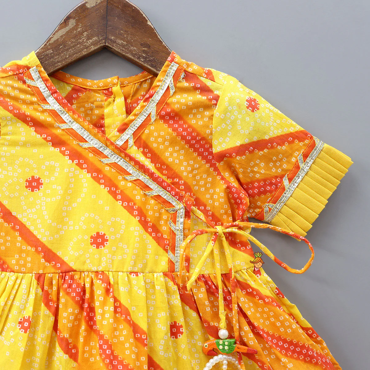 Bandhani Printed Angarkha-Style Kurti With Headband And Booties - Image 4