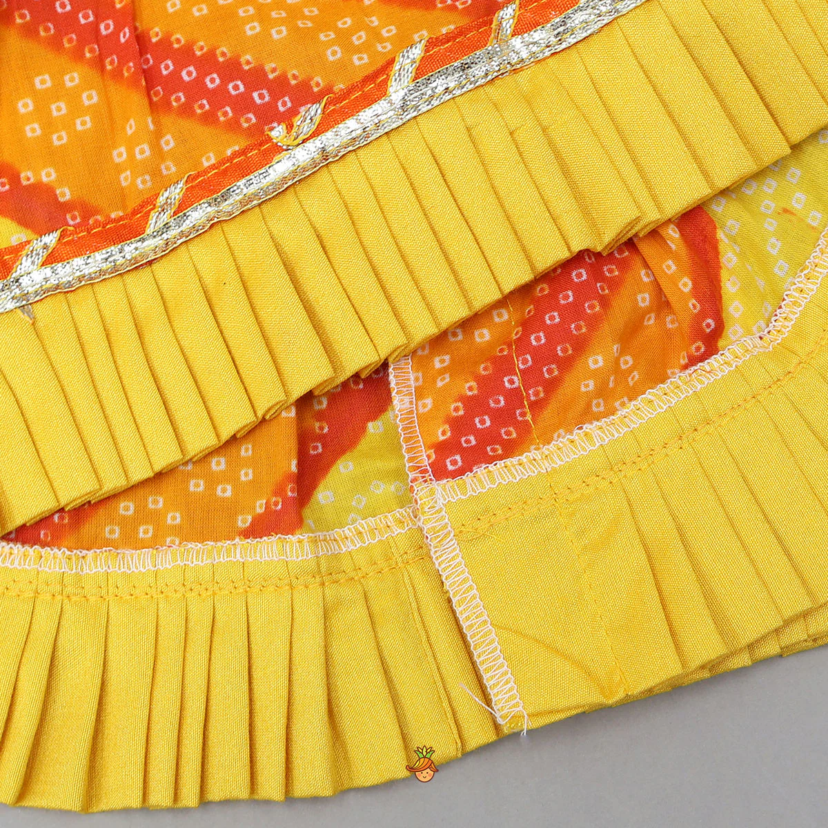 Bandhani Printed Angarkha-Style Kurti With Headband And Booties - Image 5