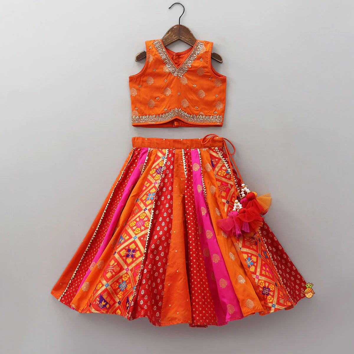 Embroidered Elegant Top And Brocade Lehenga With Matching Net Dupatta And Brocade Potli Bag - Image 3