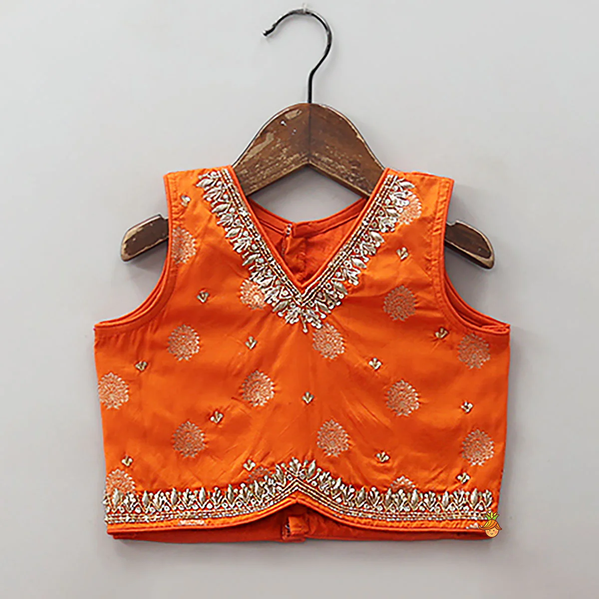 Embroidered Elegant Top And Brocade Lehenga With Matching Net Dupatta And Brocade Potli Bag - Image 4