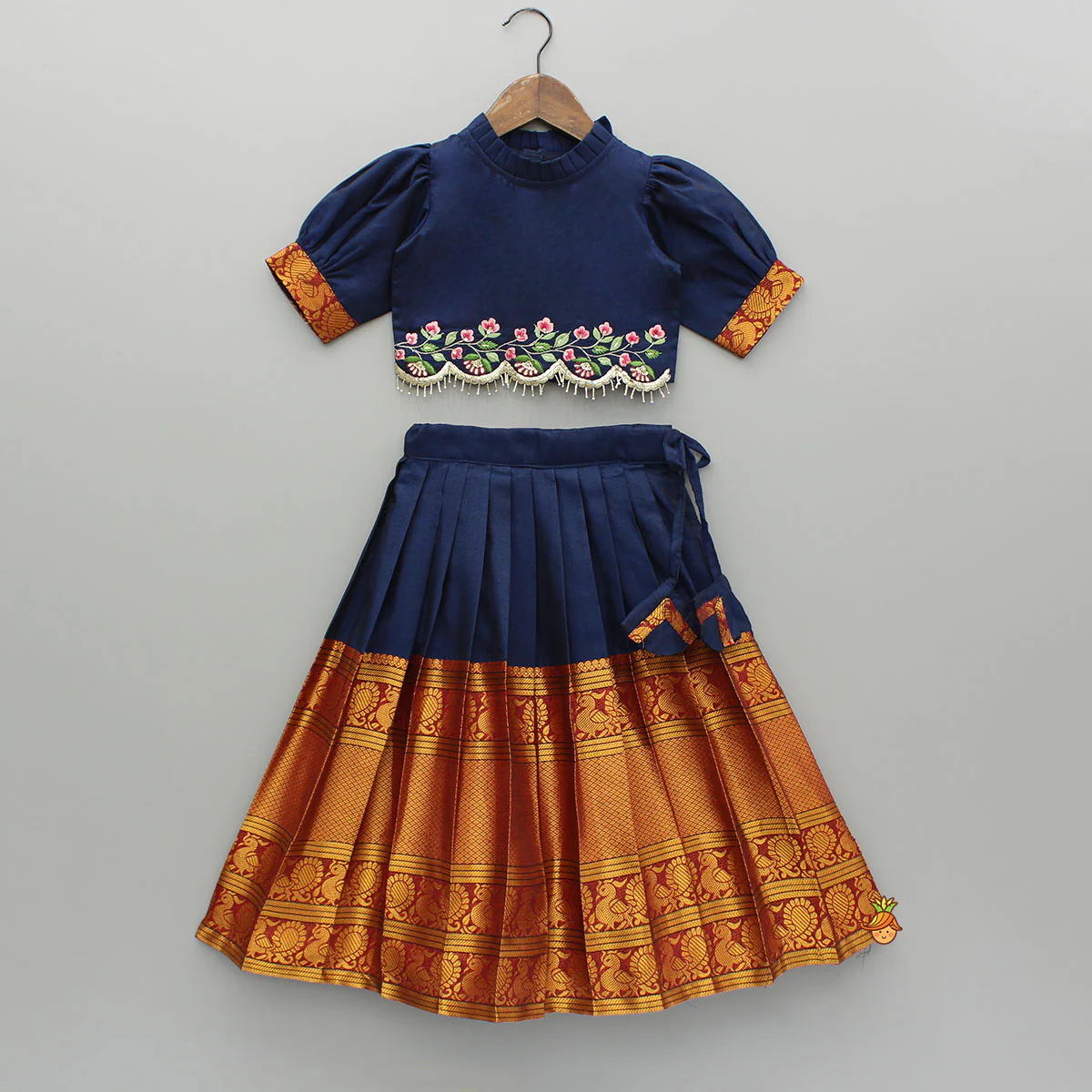 Floral Embroidered Top And Pleated Lehenga