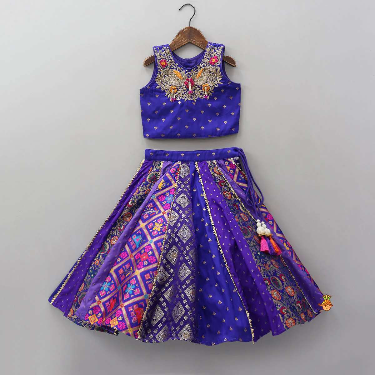 Gorgeous Embroidered Top And Brocade Lehenga With Matching Net Dupatta And Brocade Potli Bag - Image 3