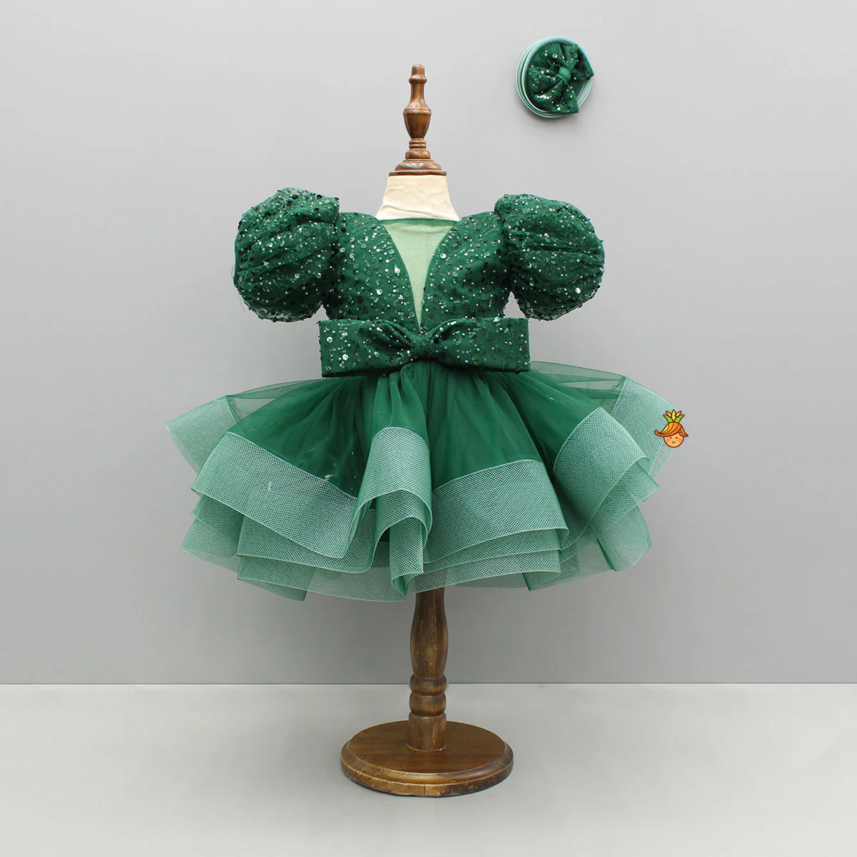 Green Sequined Ruffled Dress With Bows And Matching Swirled Bow Hairclip