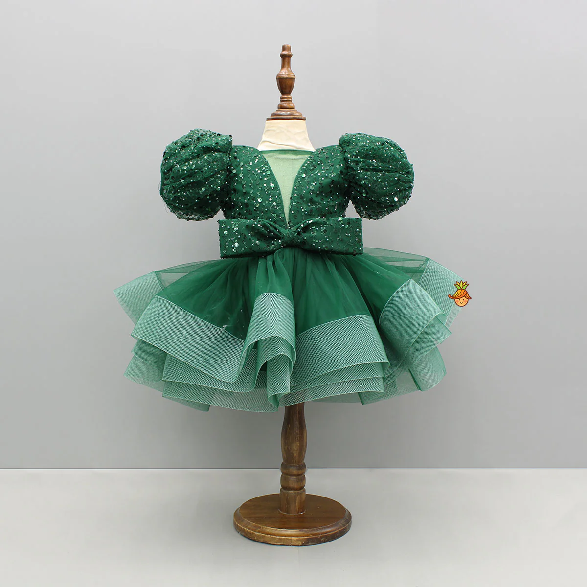 Green Sequined Ruffled Dress With Bows And Matching Swirled Bow Hairclip - Image 3
