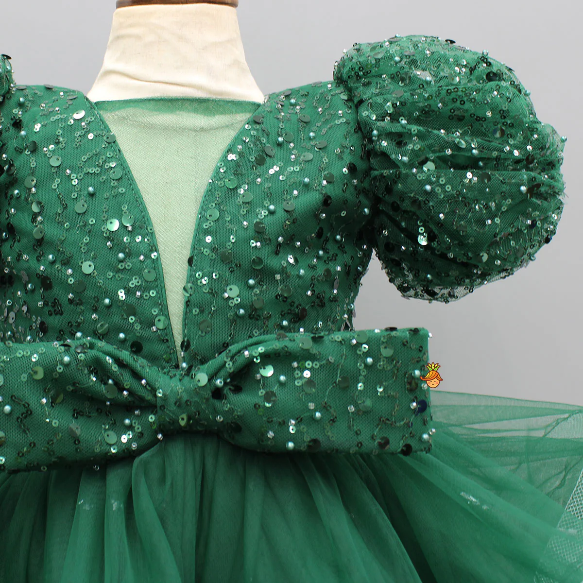Green Sequined Ruffled Dress With Bows And Matching Swirled Bow Hairclip - Image 4