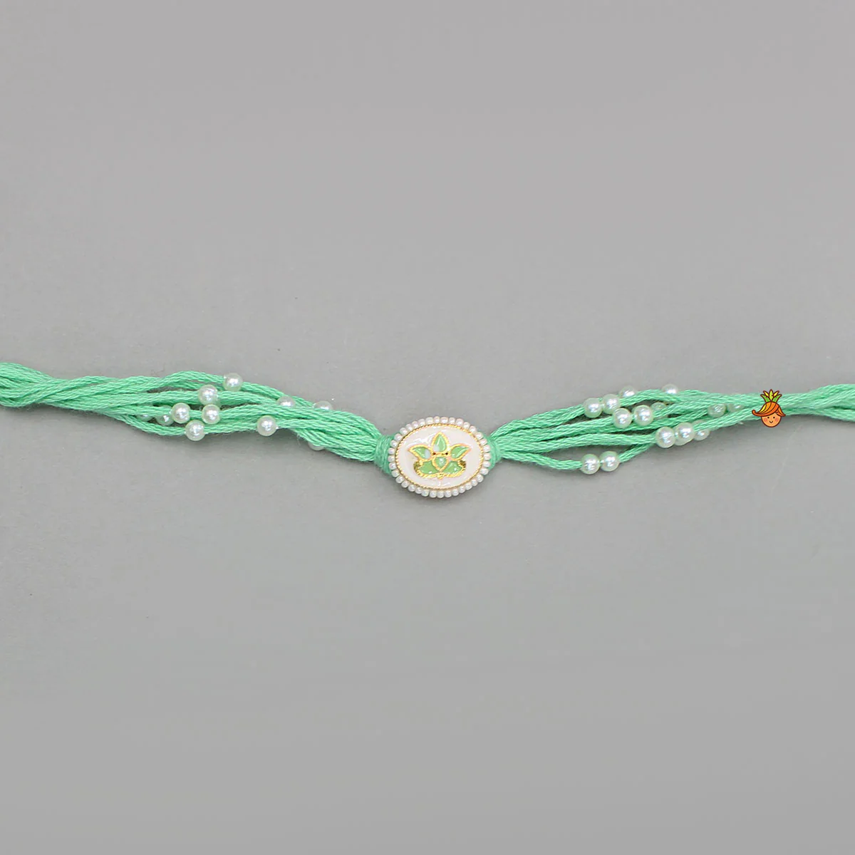 Green Thread Lotus Rakhi - Image 3