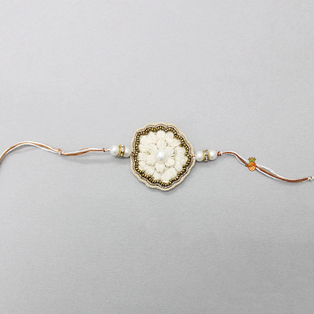 Hand Embroidered Rakhi With Flower Design - Image 3