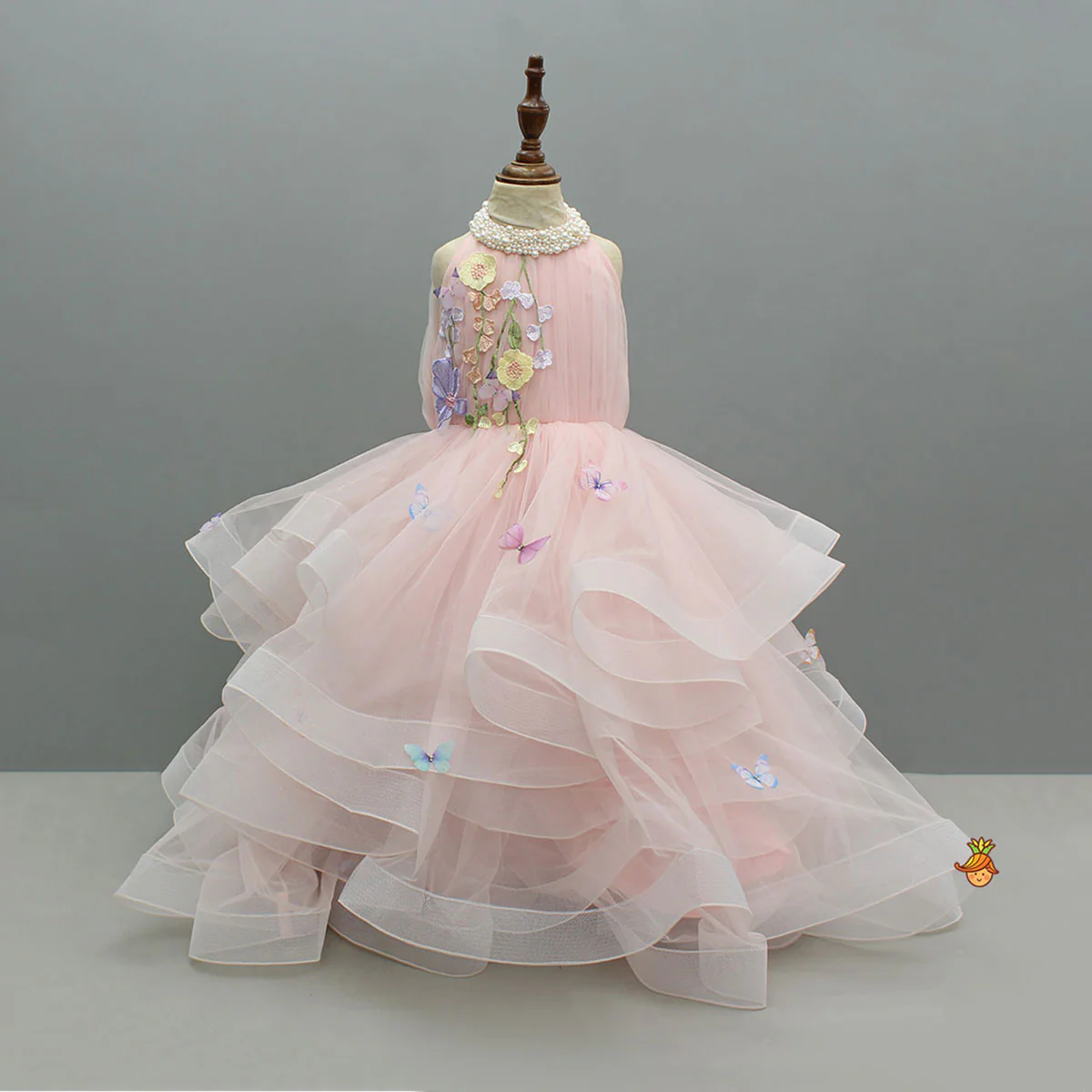 Pink Ruffled Butterfly Gown With Floral Embellishments