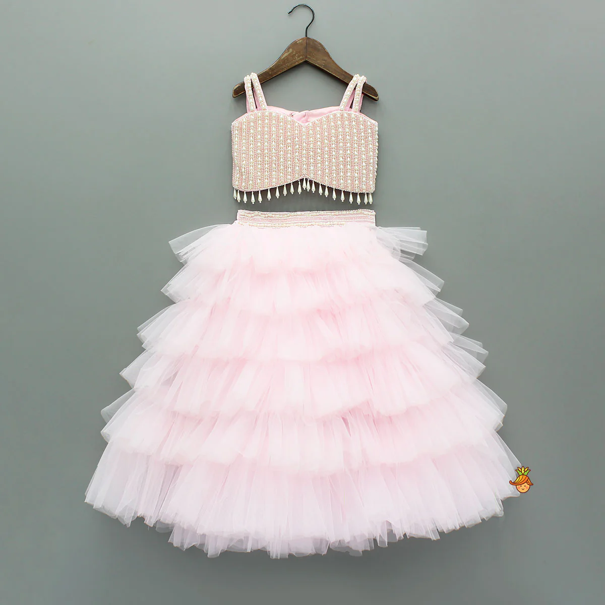 Pink Stylish Strappy Top And Ruffle Net Lehenga