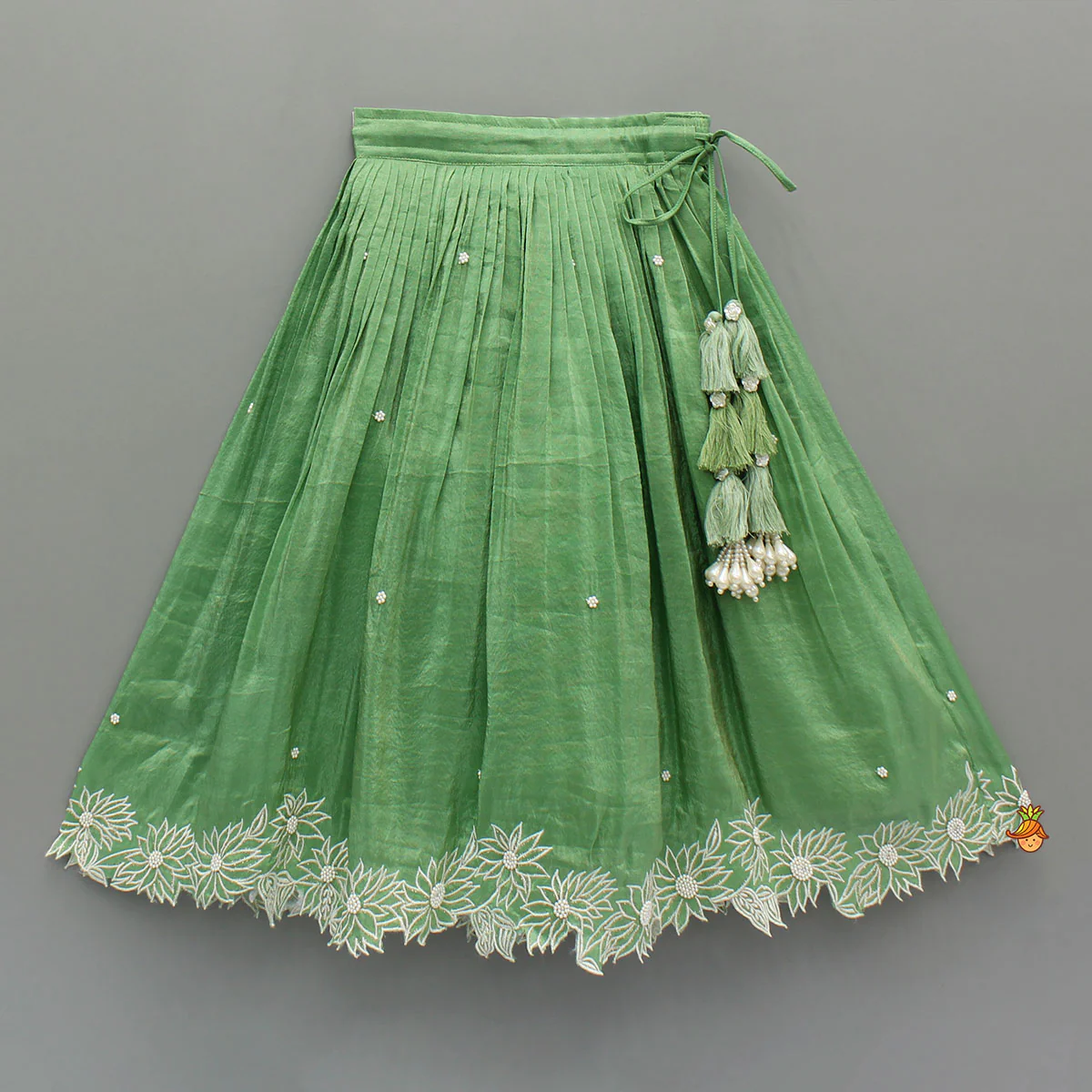 Pleated Neckline Green Shimmery Top And Fringes Tassels Enhanced Lehenga - Image 4