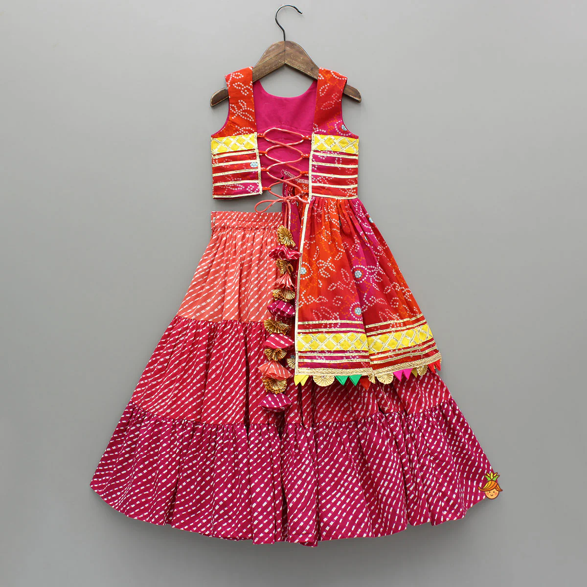 Printed Stylish Kurti And Lehenga With Attached Matching Potli And Dupatta - Image 2
