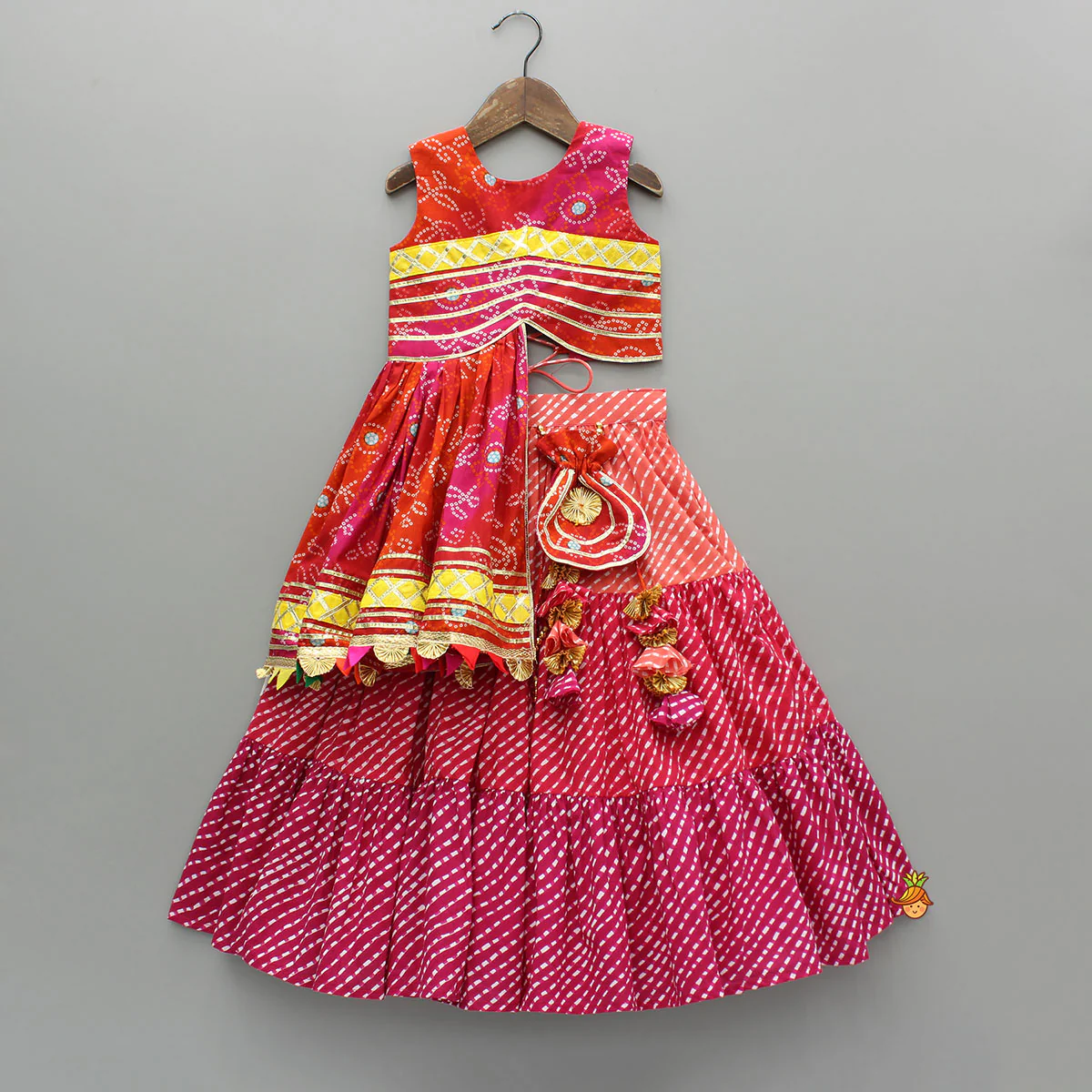 Printed Stylish Kurti And Lehenga With Attached Matching Potli And Dupatta - Image 3
