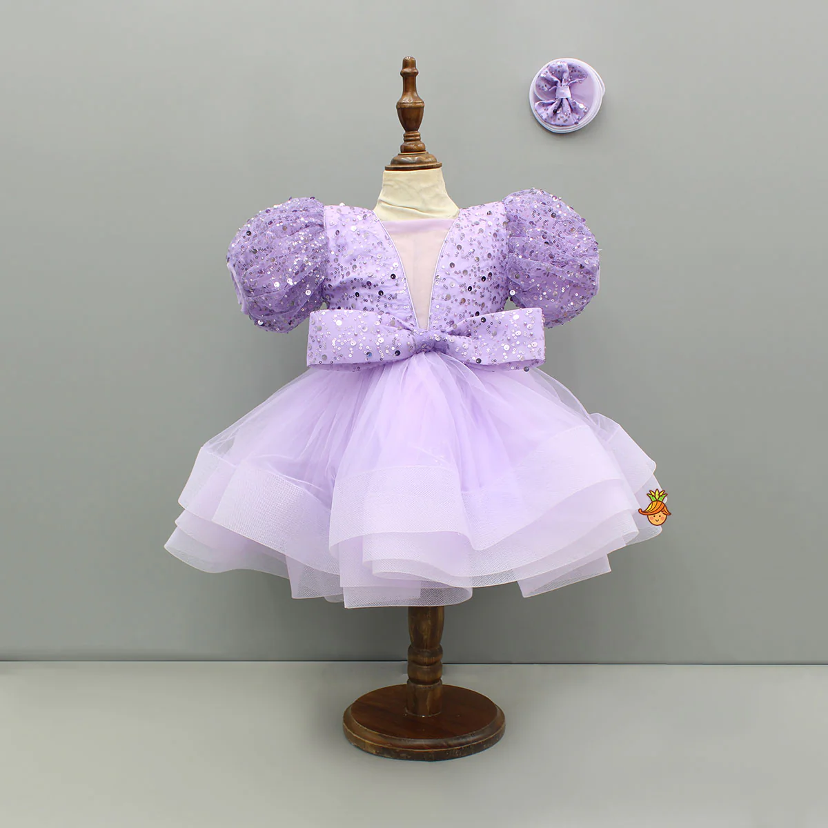 Sequined Ruffled Lavender Dress With Bows And Matching Swirled Bow Hairclip