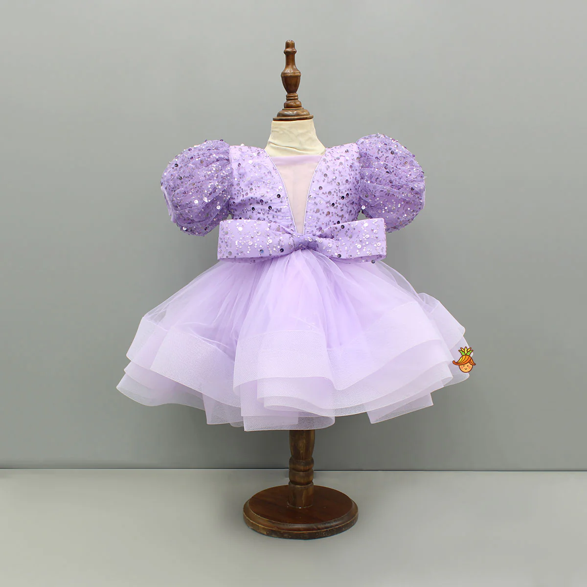 Sequined Ruffled Lavender Dress With Bows And Matching Swirled Bow Hairclip - Image 3