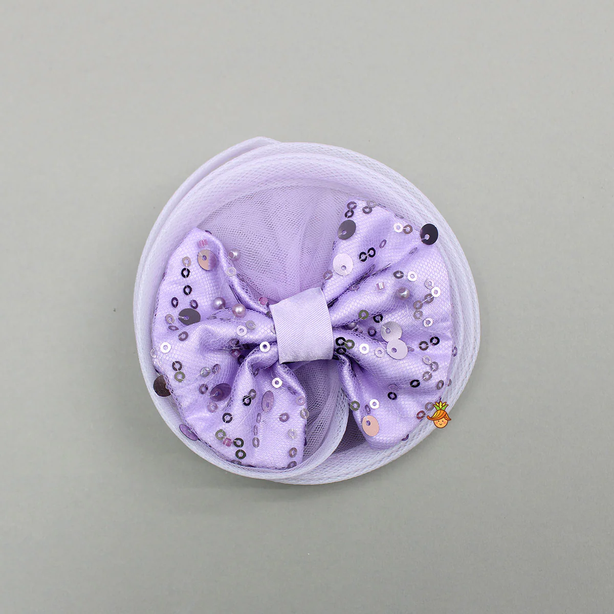 Sequined Ruffled Lavender Dress With Bows And Matching Swirled Bow Hairclip - Image 6