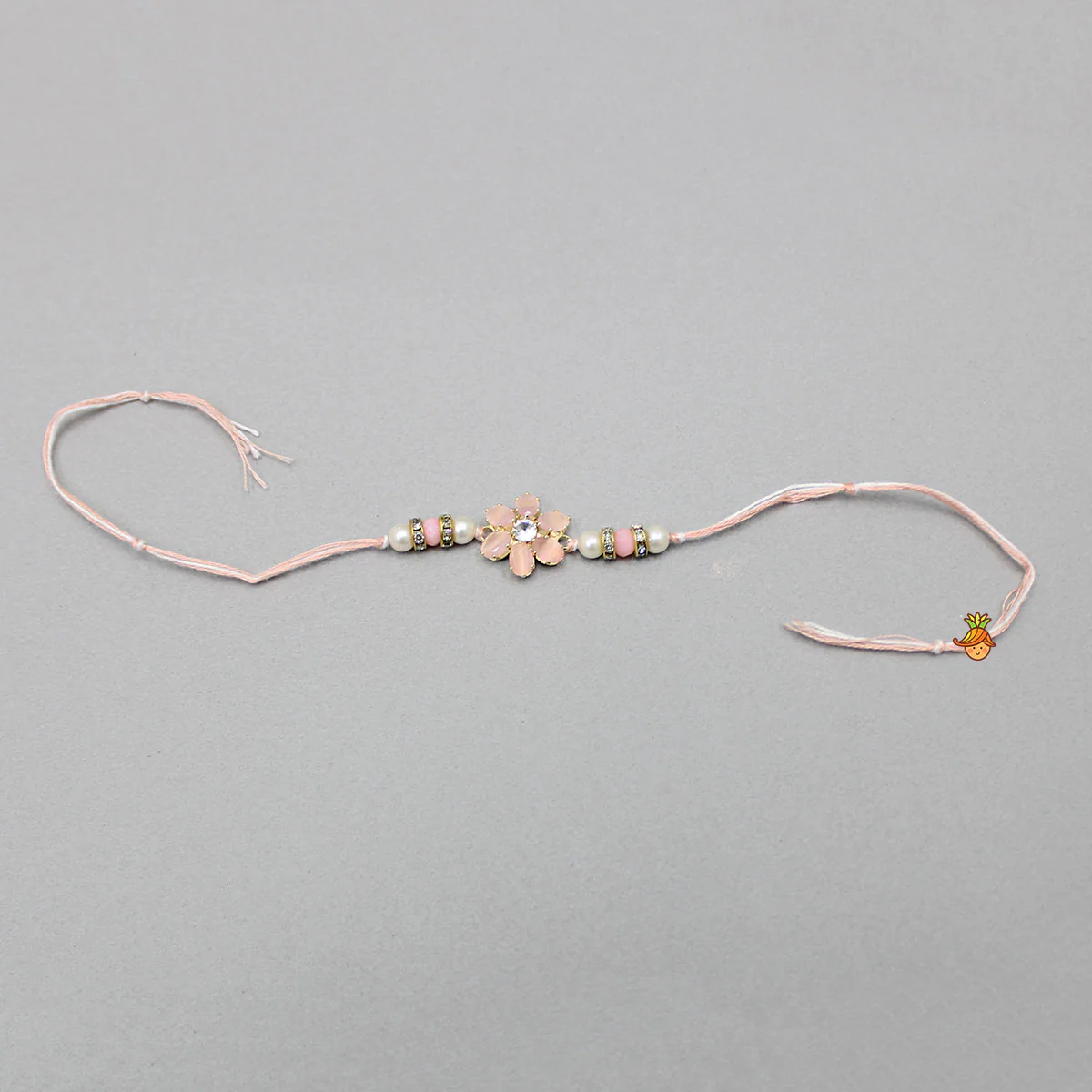 Stone Studded Flower Rakhi