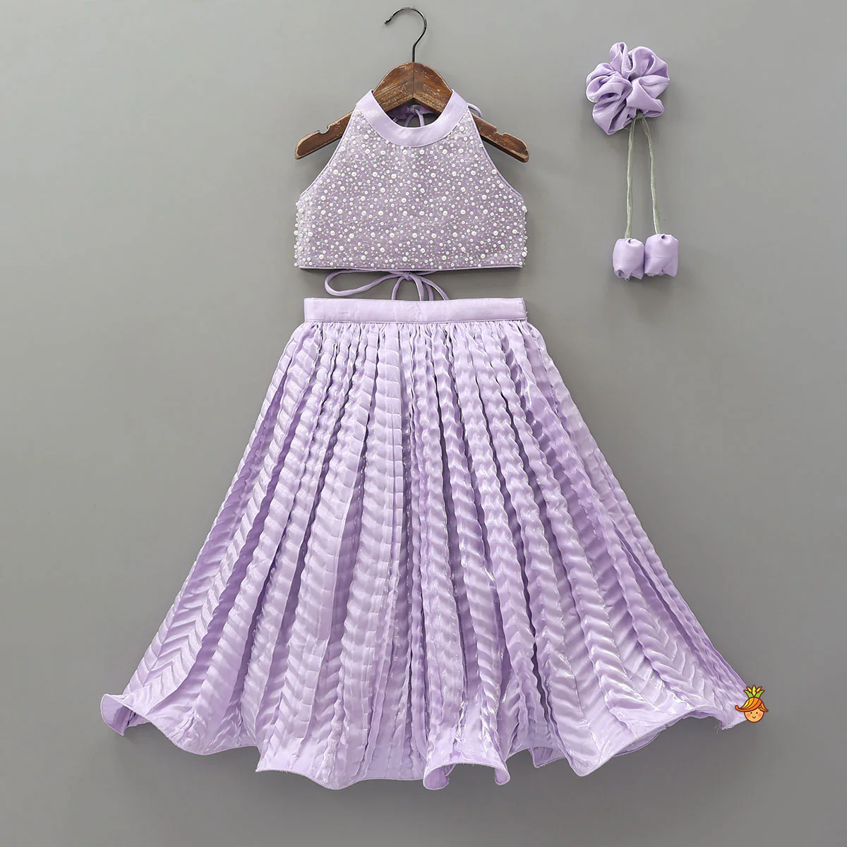 Stunning Criss Cross Back Knot Top And Crushed Sheen Lehenga With Matching Hair Tie