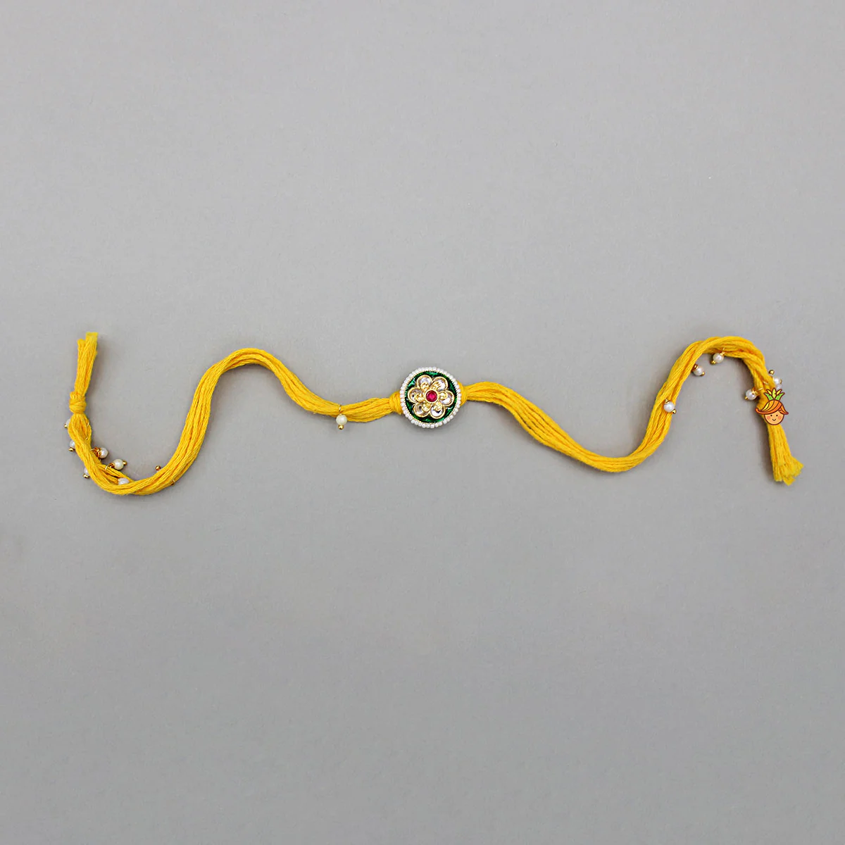 Yellow Thread Floral Design Rakhi